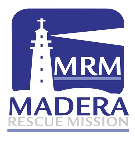 The Madera Rescue Mission logo: a white lighthouse with a cross on top, its beam crossing a navy square, above the letters MRM.